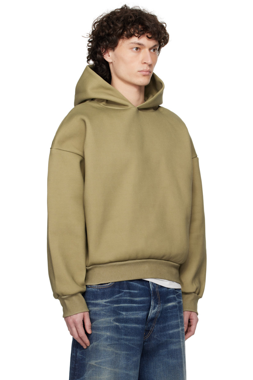 Double-faced 610 gsm cotton-blend jersey hoodie.

· Rib-knit hem and cuffs
· Dropped shoulders

Supplier color: Mustard