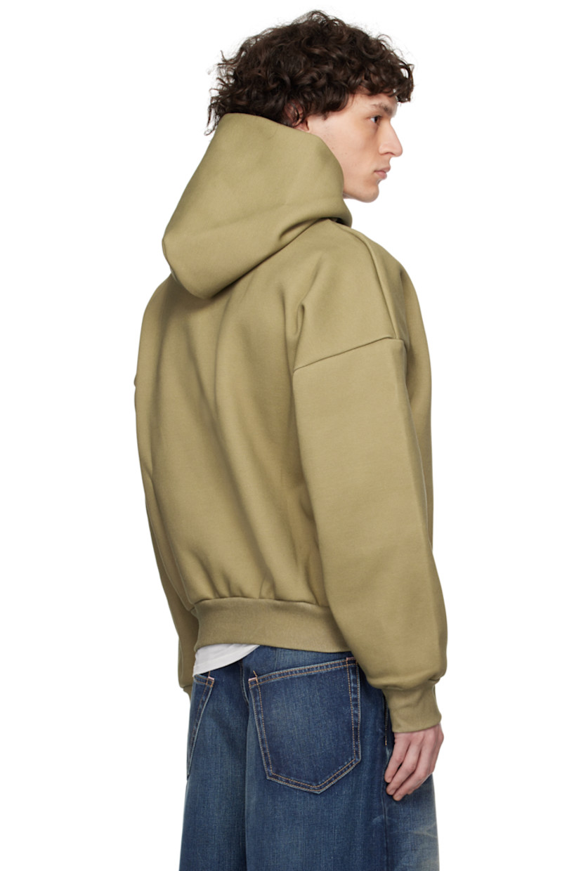 Double-faced 610 gsm cotton-blend jersey hoodie.

· Rib-knit hem and cuffs
· Dropped shoulders

Supplier color: Mustard