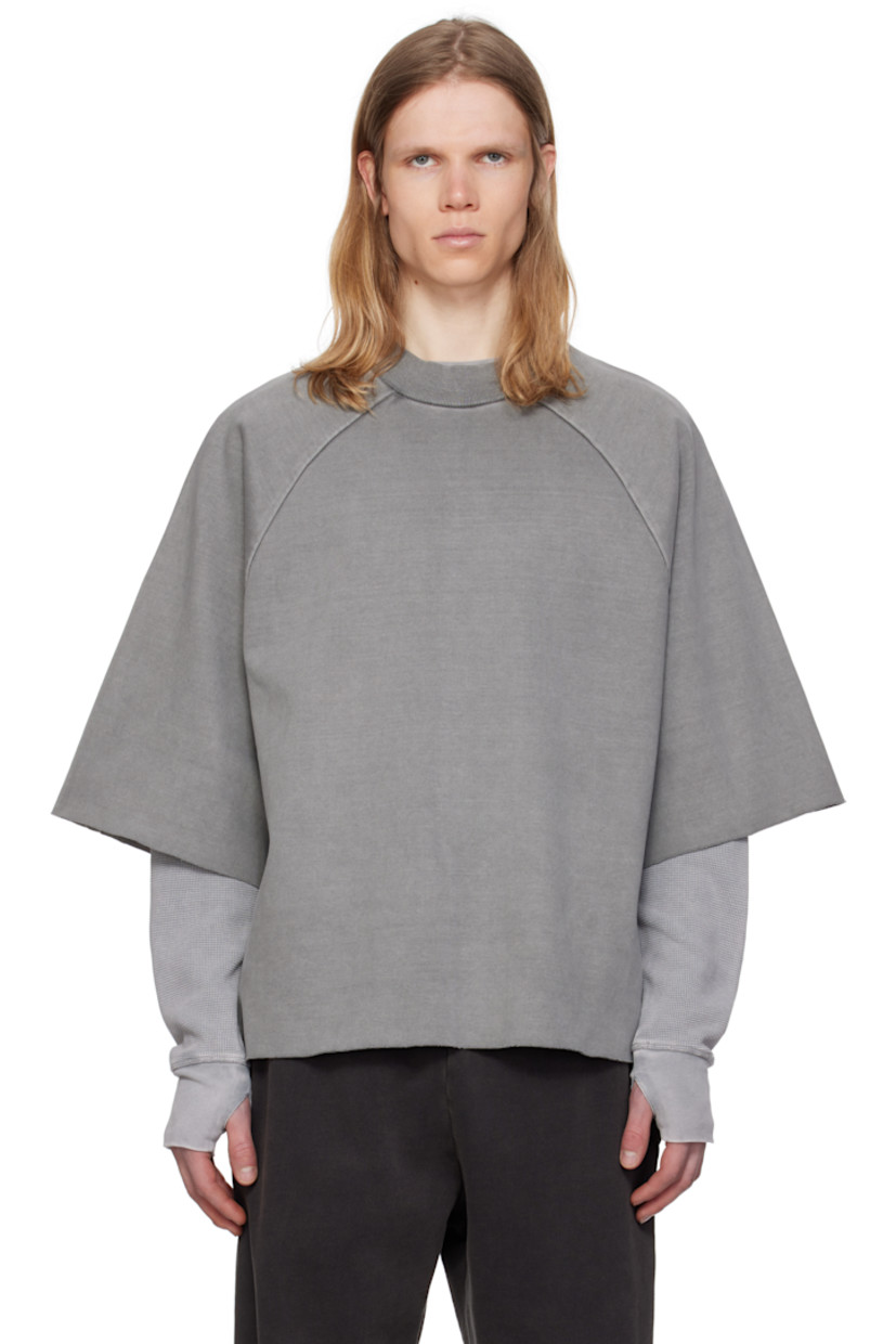 Boxy-fit cotton jersey T-shirt. Fading throughout.

· Rib-knit crewneck
· Raw edge at hem and cuffs
· Raglan sleeves
· Central seam at back

Supplier color: Washed slate