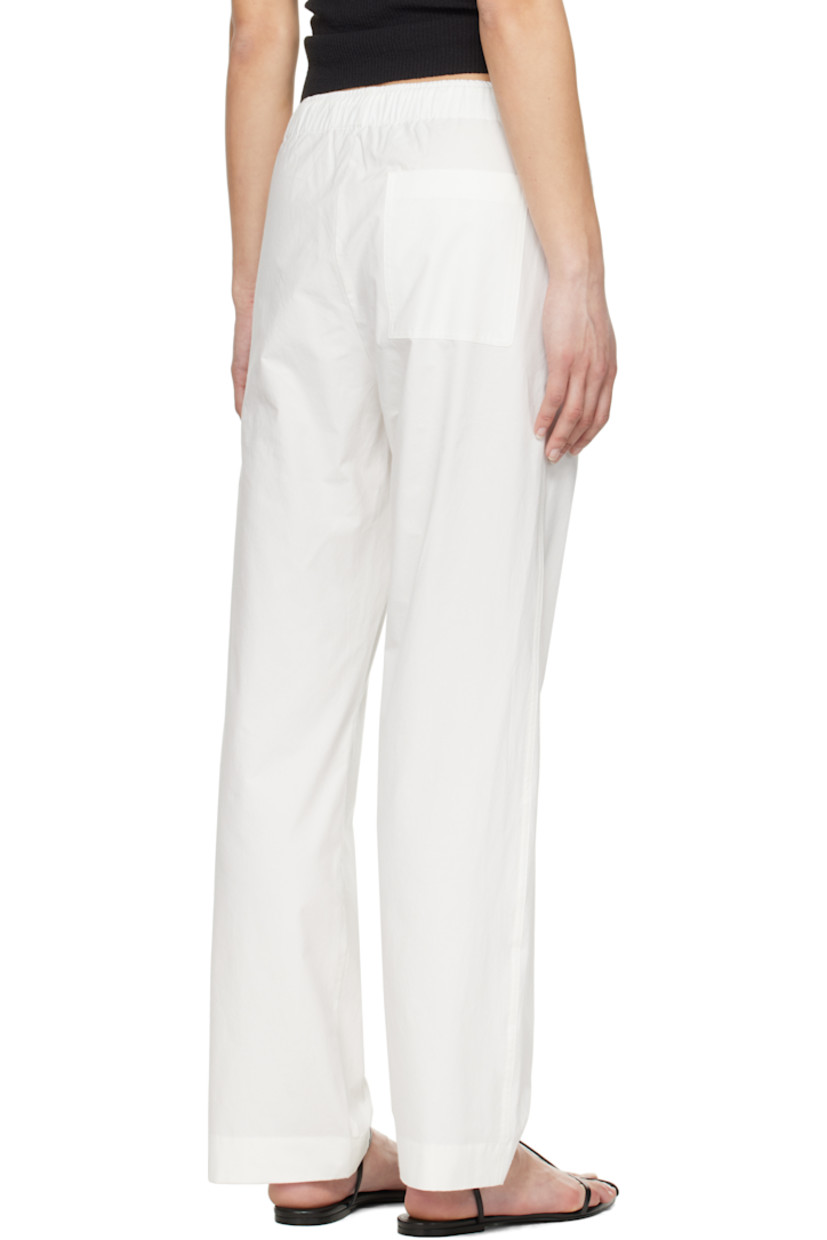 Cotton poplin trousers.

· Drawstring at elasticized waistband 
· Three-pocket styling

Supplier color: White