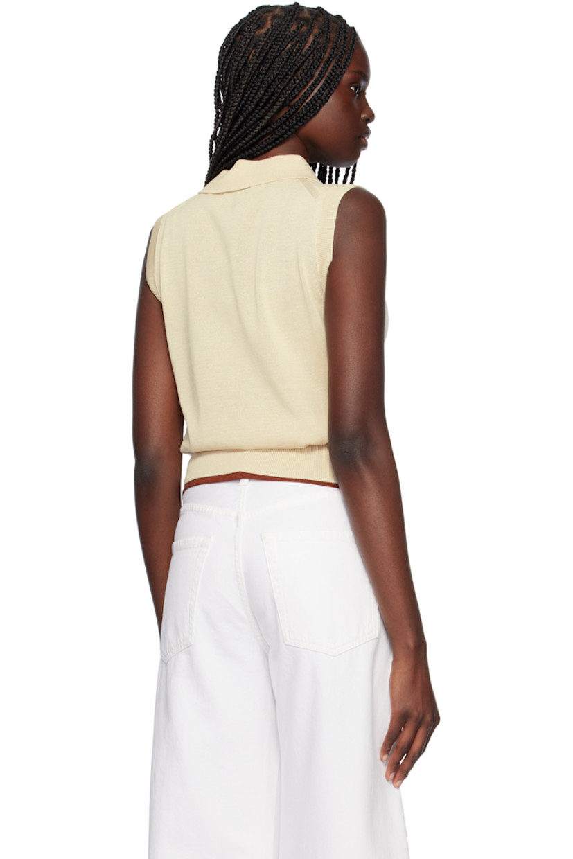 Knit viscose-blend polo.

· Rib-knit spread collar, hem, and armscyes
· Three-button placket

Supplier color: Beige