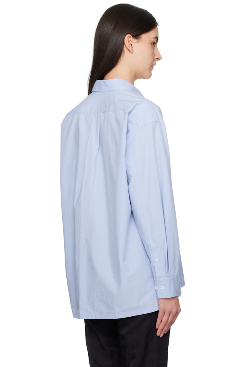 Oversized cotton poplin shirt.

· Spread collar
· Button closure
· Patch pocket
· Logo embroidered at front
· Droptail hem
· Vented side seams
· Dropped shoulders
· Pleated adjustable single-button barrel cuffs
· Box pleat at back yoke
· Logo-engraved mother-of-pearl hardware

Supplier color: Light blue