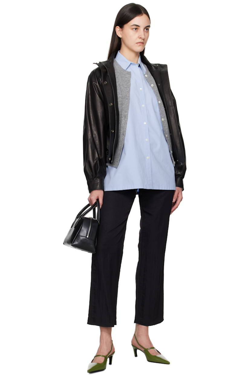 Oversized cotton poplin shirt.

· Spread collar
· Button closure
· Patch pocket
· Logo embroidered at front
· Droptail hem
· Vented side seams
· Dropped shoulders
· Pleated adjustable single-button barrel cuffs
· Box pleat at back yoke
· Logo-engraved mother-of-pearl hardware

Supplier color: Light blue