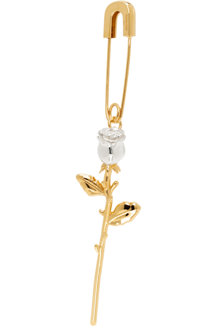 Single drop earring in gold-tone sterling silver. 

· Graphic charm at drop
· Logo engraved at safety-pin fastening 
· H3.5" x W1"

Supplier color: Gold