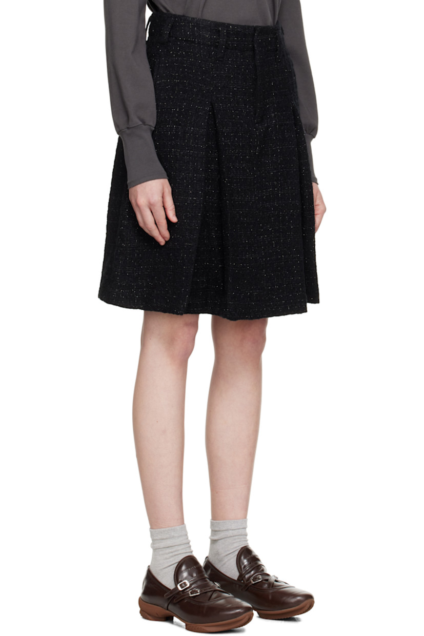 Wool-blend tweed midi skirt. Metallic threads throughout.

· Belt loops
· Three-pocket styling
· Zip fly
· Inverted box pleats at front and back

Supplier color: Black