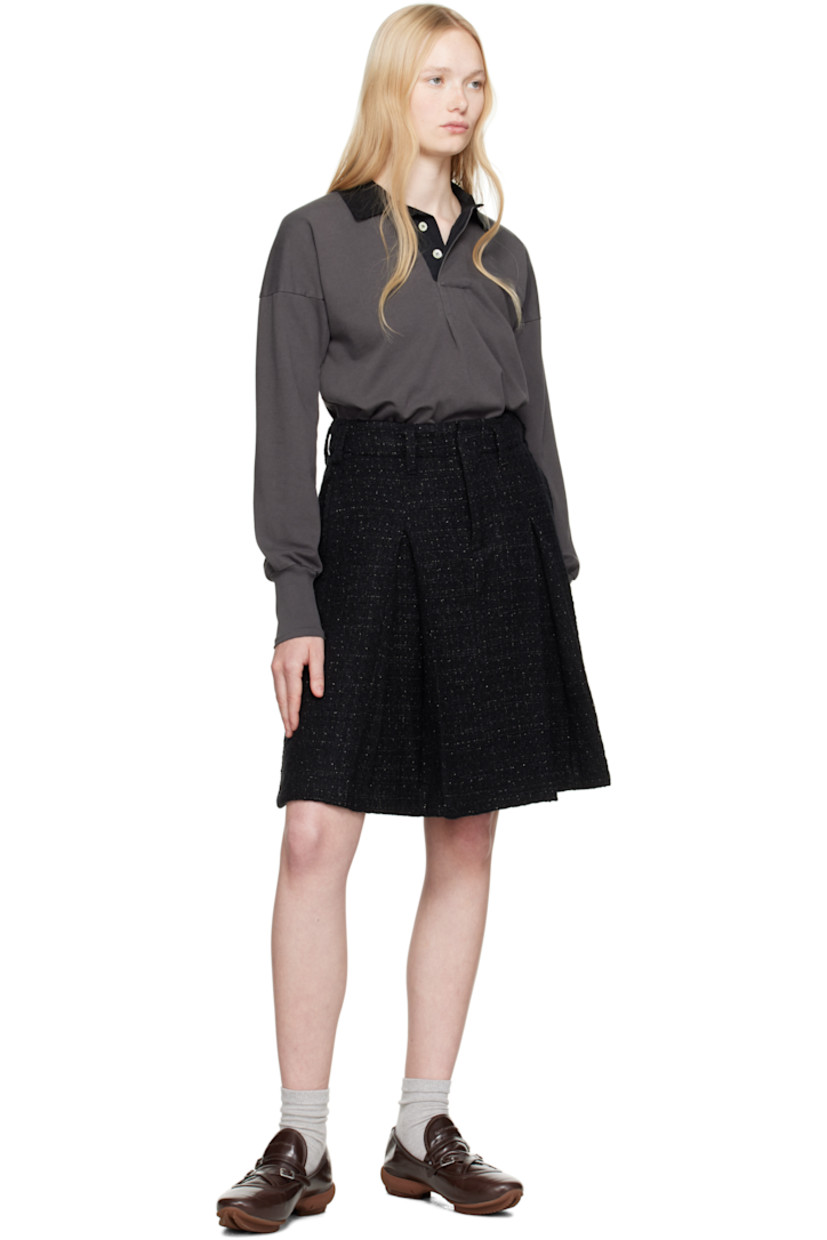 Wool-blend tweed midi skirt. Metallic threads throughout.

· Belt loops
· Three-pocket styling
· Zip fly
· Inverted box pleats at front and back

Supplier color: Black
