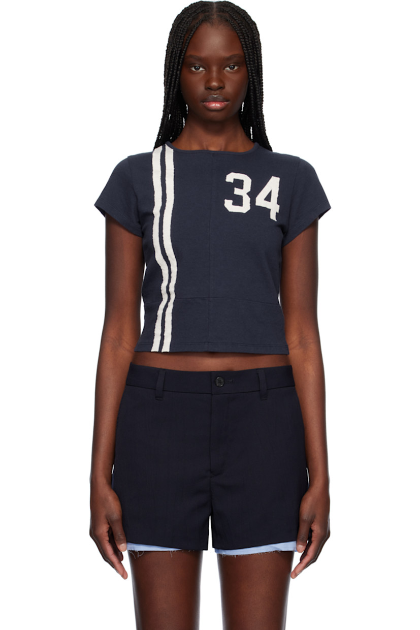 Cotton jersey T-shirt.

· Paneled construction
· Rib-knit crewneck
· Stripes at front
· Text appliqués at chest and back
· Cropped hem

Supplier color: Navy