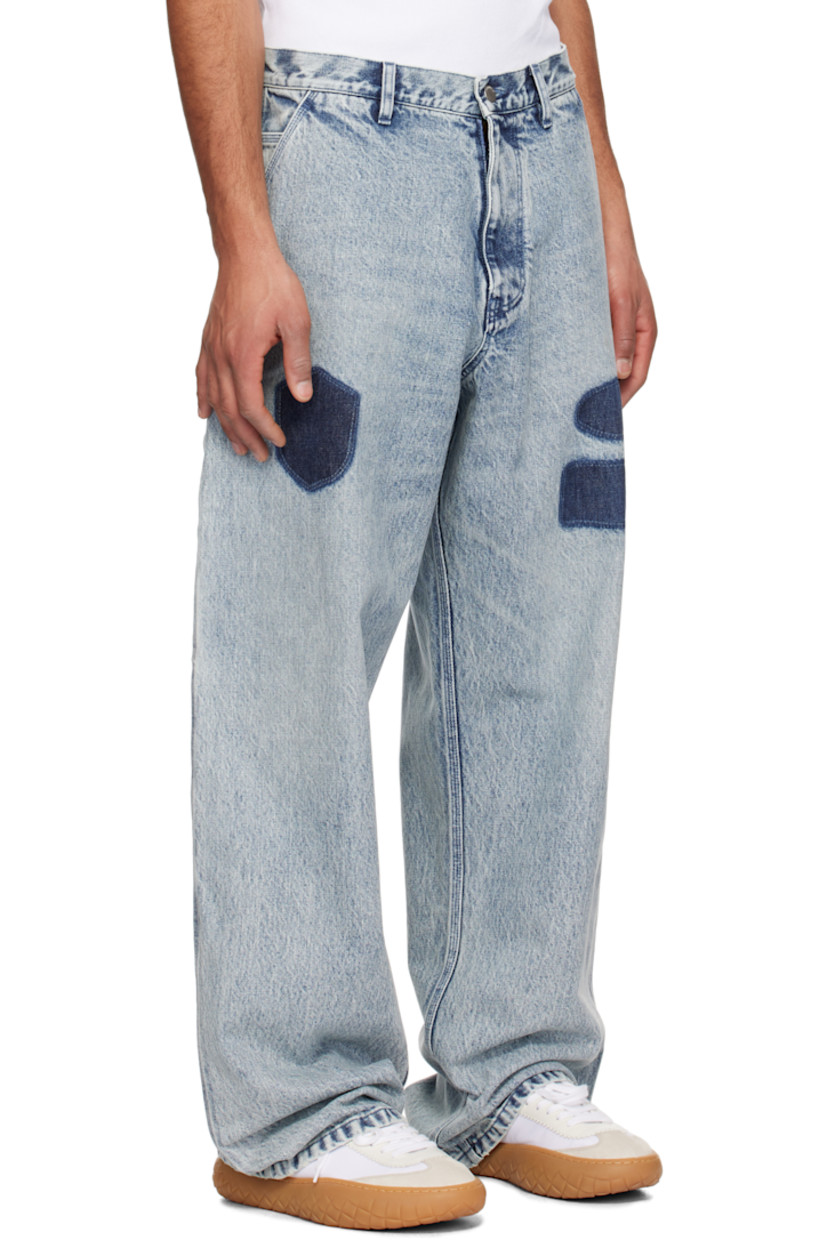 Relaxed-fit non-stretch denim jeans. Fading throughout.

· Belt loops
· Five-pocket styling
· Zip-fly
· Graphics printed at front
· Hammer loop and patch pocket at outseam 
· Patch pockets at outseams

Supplier color: Blue