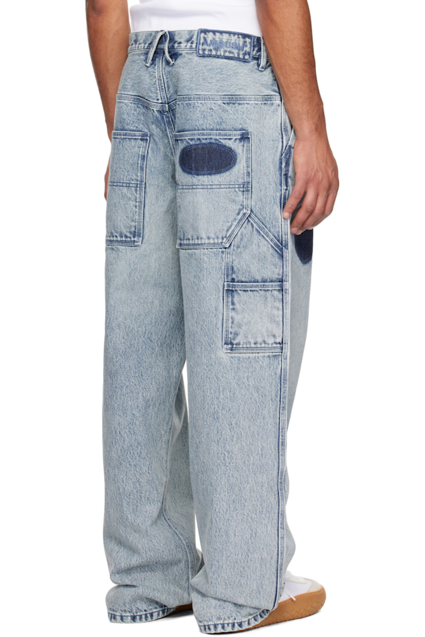 Relaxed-fit non-stretch denim jeans. Fading throughout.

· Belt loops
· Five-pocket styling
· Zip-fly
· Graphics printed at front
· Hammer loop and patch pocket at outseam 
· Patch pockets at outseams

Supplier color: Blue