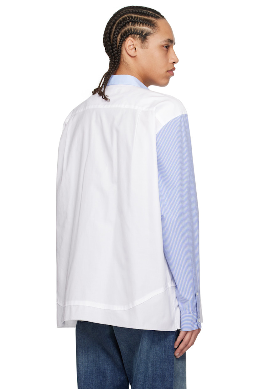 Cotton canvas and poplin shirt.

· Paneled construction
· Spread collar
· Button closure
· Logo-embroidered patch pocket at chest
· Raw edge at hem
· Vented side seams
· Stripes at sleeves
· Buttoned barrel cuffs
· Twin pleats at back yoke

Supplier color: White