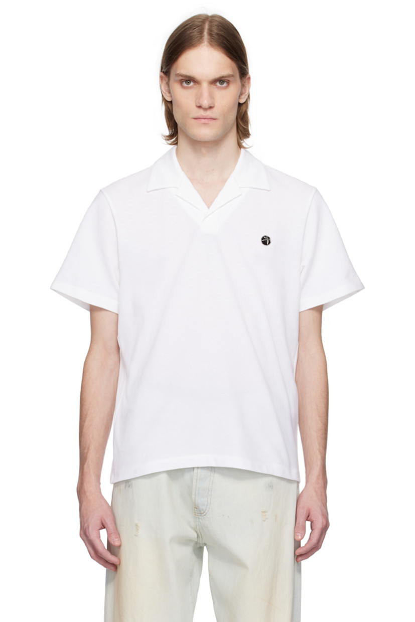 Cotton piqué polo.

· Spread collar
· Open placket
· Logo plaque at chest

Supplier color: White