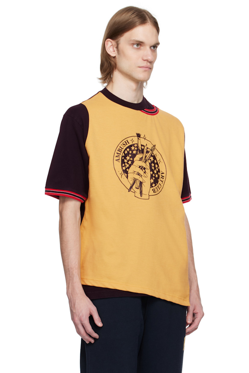 Cotton jersey T-shirt.

· Layered construction
· Stripe at rib-knit crewneck and cuffs
· Logo graphic printed at front

Supplier color: Black
