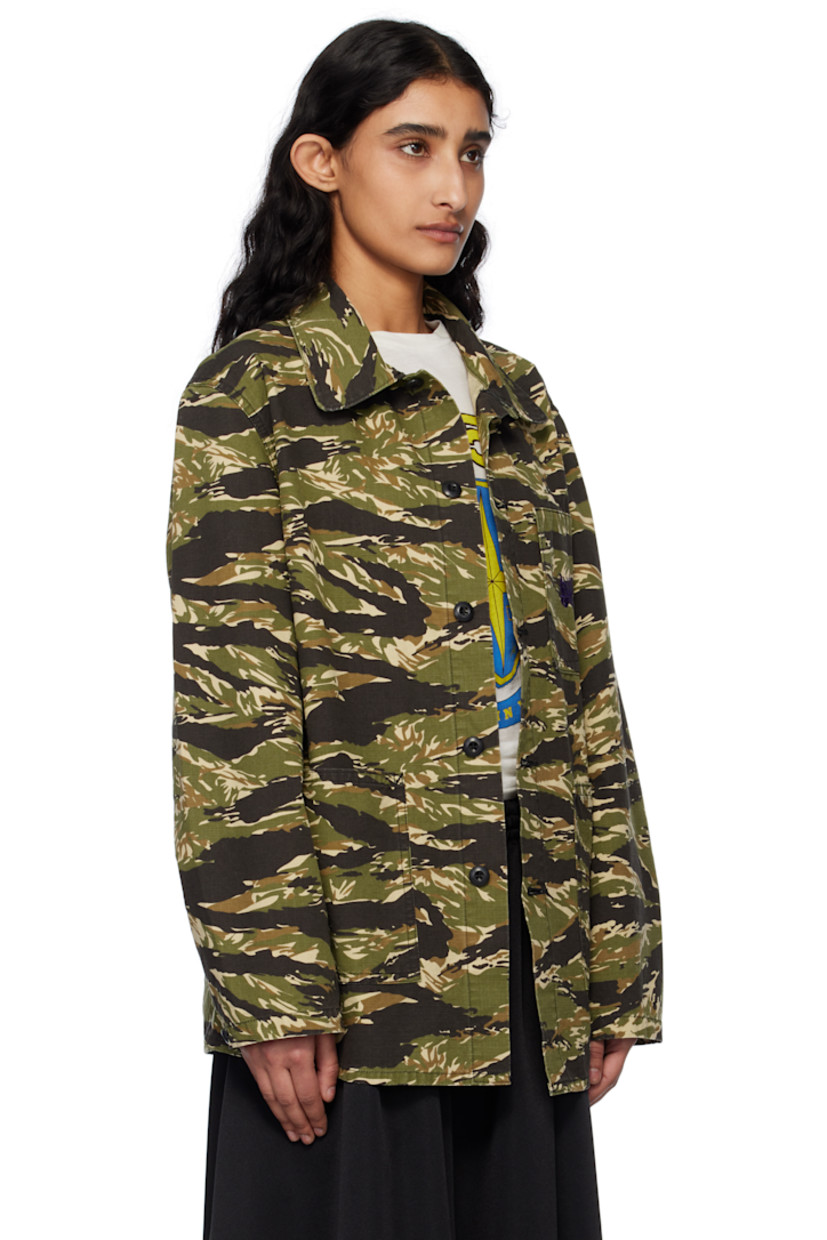 Cotton ripstop jacket. Camouflage pattern printed throughout. 

· Spread collar
· Button closure
· Logo graphic embroidered at chest
· Patch pockets
· Adjustable button fastening at cuffs
· Unlined

Supplier color: Tiger stripe