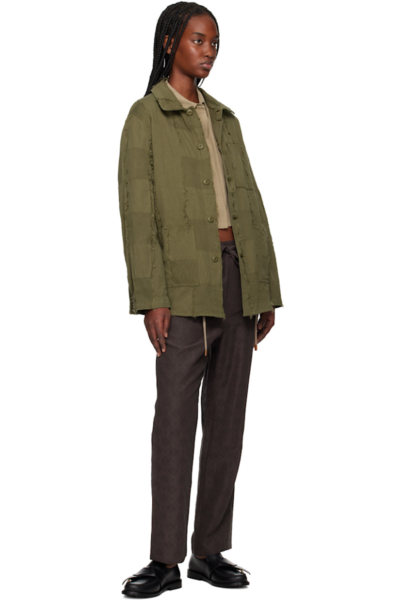 Cotton ripstop and cotton twill jacket. Frayed edges throughout. 

· Paneled construction  
· Spread collar
· Button closure
· Patch pockets
· Adjustable button fastening at cuffs
· Central seam at back 
· Unlined

Supplier color: Olive