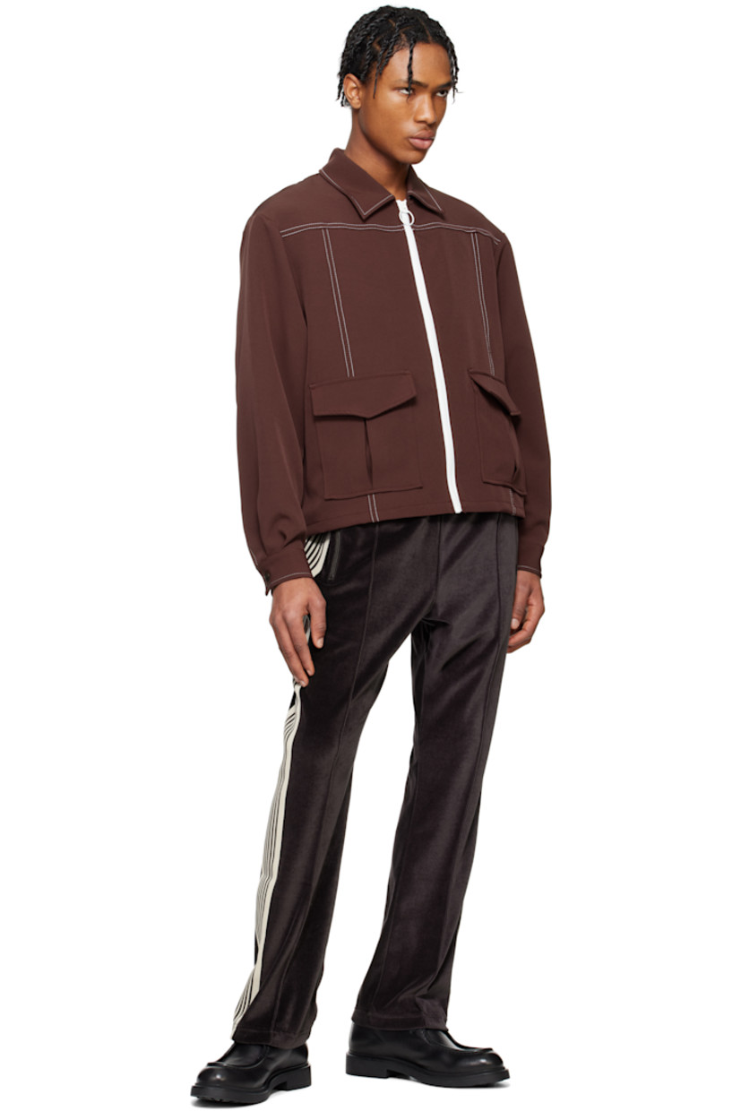 Cotton- and polyester-blend velour track pants.

· Concealed drawstring at elasticized waistband
· Three-pocket styling
· Pinched seams and embroidered logo graphic at front
· Striped knit trim at outseams

Supplier color: Charcoal