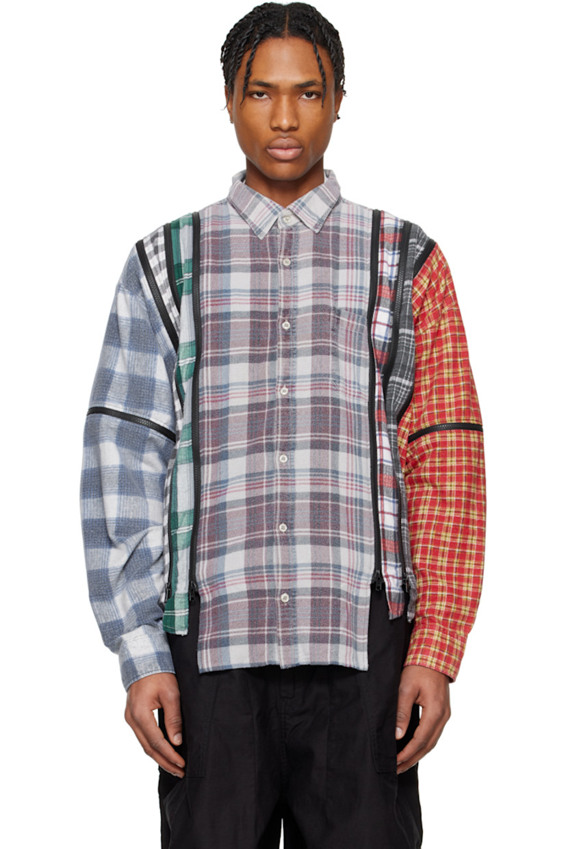 Upcycled overdyed cotton flannel shirt. Check pattern and two-way zip vents throughout.

· Paneled construction
· Spread collar
· Button closure
· Patch pocket
· Asymmetric shirttail hem
· Pleats at buttoned barrel cuffs

Each item is unique. Please note that coloration may vary.

Part of the Rebuild by Needles collection.

Supplier color: Assorted