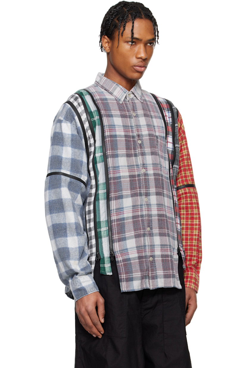 Upcycled overdyed cotton flannel shirt. Check pattern and two-way zip vents throughout.

· Paneled construction
· Spread collar
· Button closure
· Patch pocket
· Asymmetric shirttail hem
· Pleats at buttoned barrel cuffs

Each item is unique. Please note that coloration may vary.

Part of the Rebuild by Needles collection.

Supplier color: Assorted