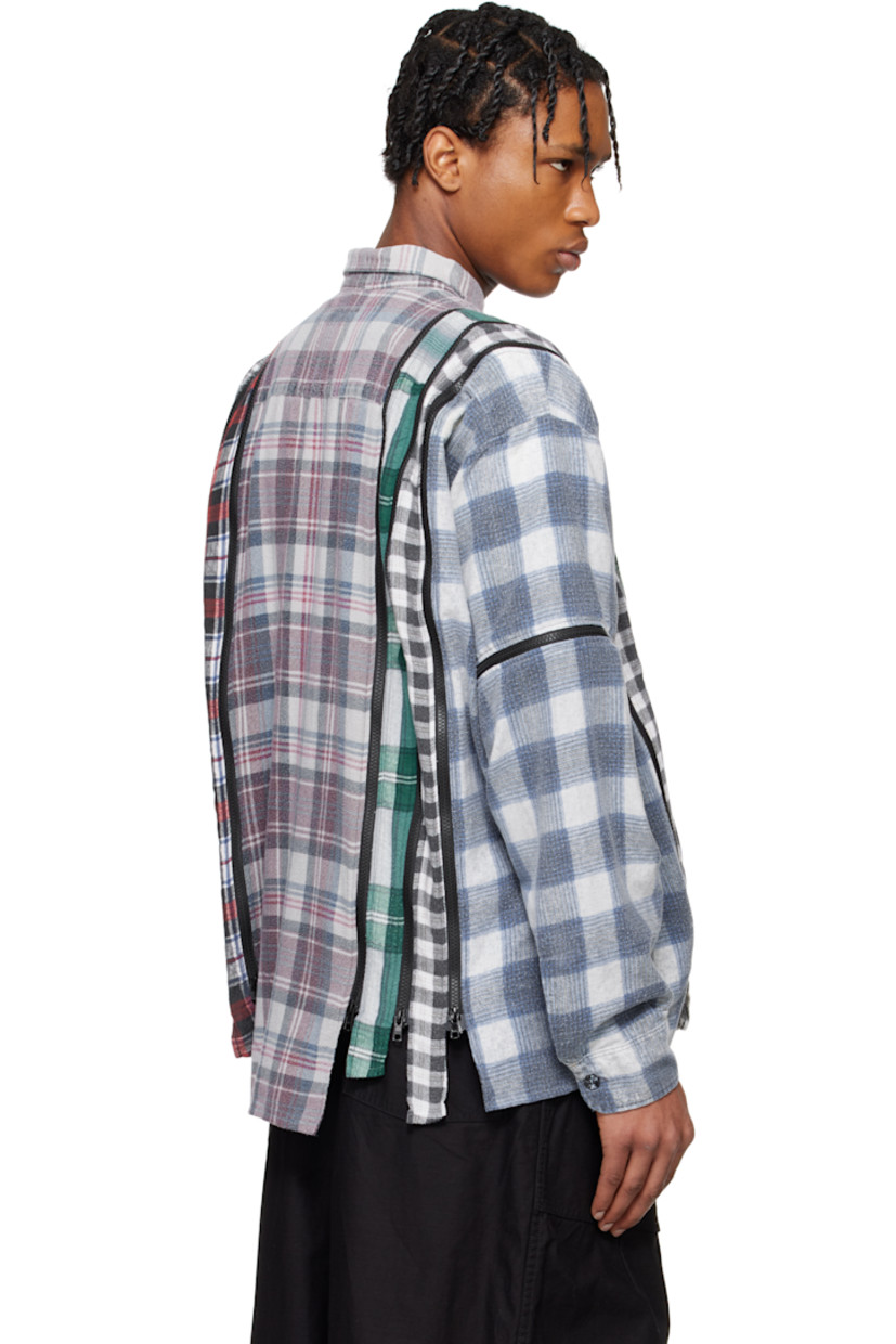 Upcycled overdyed cotton flannel shirt. Check pattern and two-way zip vents throughout.

· Paneled construction
· Spread collar
· Button closure
· Patch pocket
· Asymmetric shirttail hem
· Pleats at buttoned barrel cuffs

Each item is unique. Please note that coloration may vary.

Part of the Rebuild by Needles collection.

Supplier color: Assorted