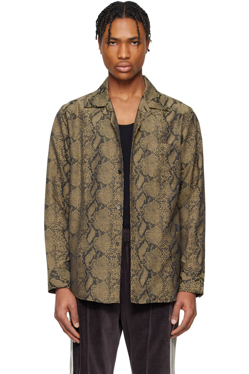 Polyester- and cotton-blend twill shirt. Jacquard snakeskin pattern throughout. 

· Spread collar
· Button closure
· Patch pocket
· Shirttail hem
· Pleat at buttoned barrel cuffs
· Box pleat at yoke

Supplier color: Brown