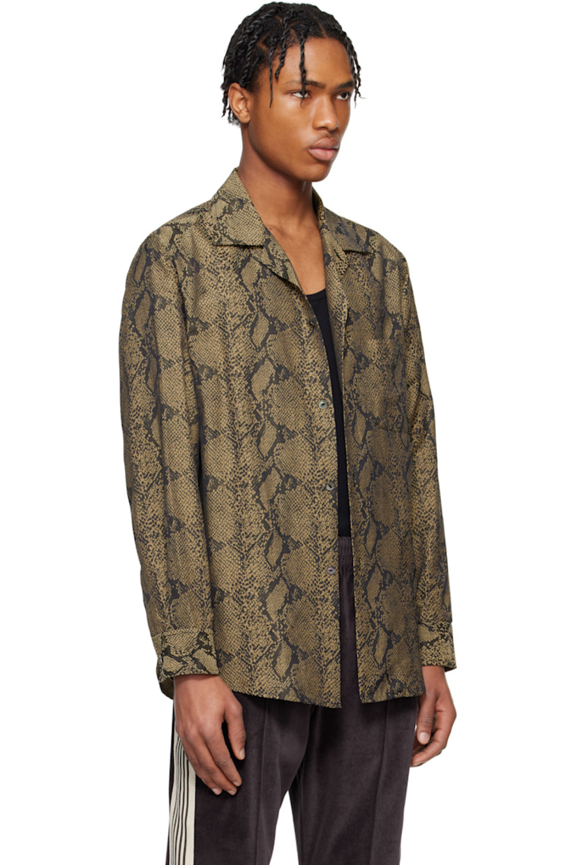 Polyester- and cotton-blend twill shirt. Jacquard snakeskin pattern throughout. 

· Spread collar
· Button closure
· Patch pocket
· Shirttail hem
· Pleat at buttoned barrel cuffs
· Box pleat at yoke

Supplier color: Brown