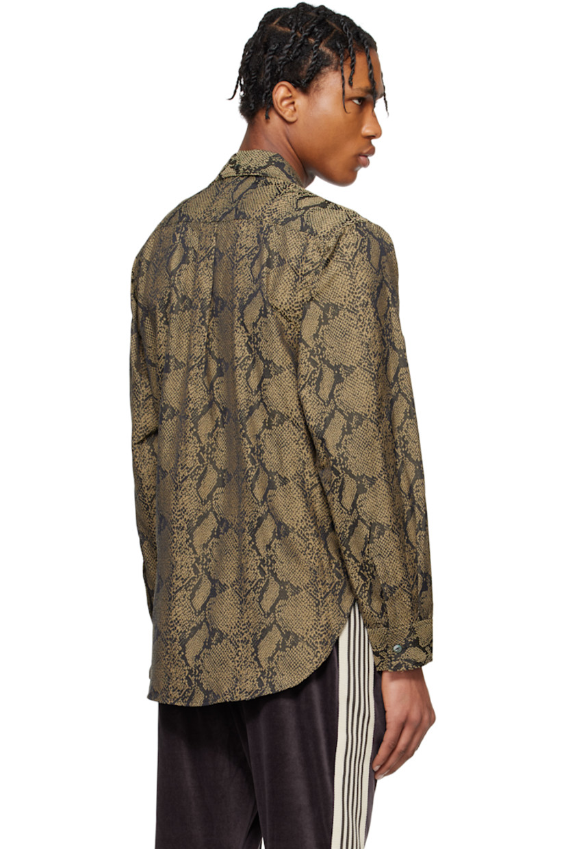 Polyester- and cotton-blend twill shirt. Jacquard snakeskin pattern throughout. 

· Spread collar
· Button closure
· Patch pocket
· Shirttail hem
· Pleat at buttoned barrel cuffs
· Box pleat at yoke

Supplier color: Brown