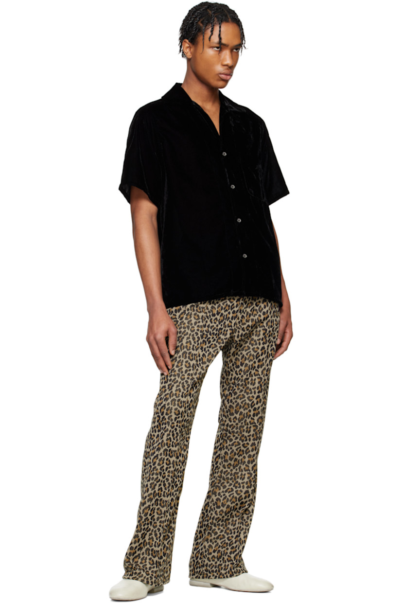 Rayon- and polyester-blend velvet shirt. 

· Open spread collar
· Button closure
· Patch pocket

Supplier color: Black