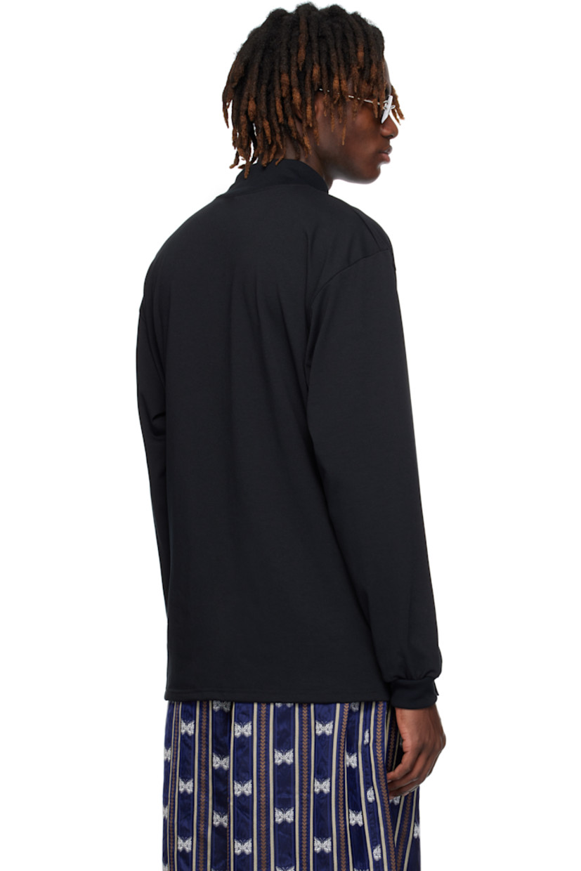 Polyester jersey T-shirt. 

· Rib-kit mock neck and cuffs
· Logo graphic embroidered at chest

Supplier color: Black