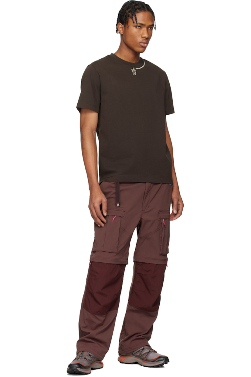 Cotton jersey T-shirt.

· Rib-knit crewneck
· Logo and text printed at collar
· Tricolor logo flag at side seam
· Tennis-tail hem
· Text bonded at back hem

Supplier color: Brown