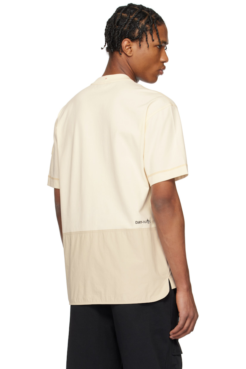 Stretch cotton jersey T-shirt.

· Rib-knit crewneck
· Ripstop bellows pockets at chest
· Tricolor logo flag at pocket
· Droptail hem
· Vented side seams
· Embroidered logo patch at sleeve
· Logo and text bonded at back
· Ripstop panel at back hem
· Logo-engraved black hardware

Supplier color: White ivory