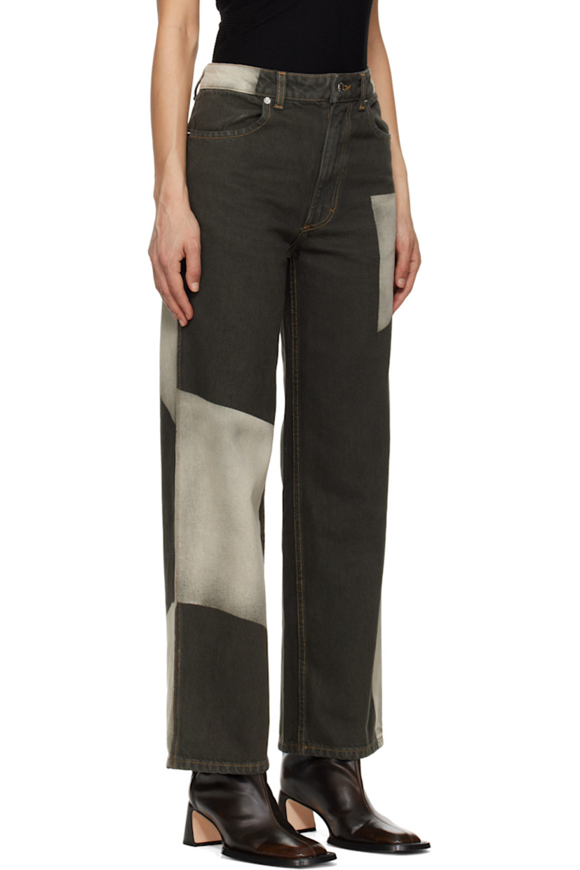 Non-stretch denim jeans. Whiskering and subtle distressing throughout. 

· Colorblocked fading printed throughout
· Belt loops
· Four-pocket styling
· Zip-fly
· Logo-engraved silver-tone hardware
· Contrast stitching in tan

Supplier color: Tile
