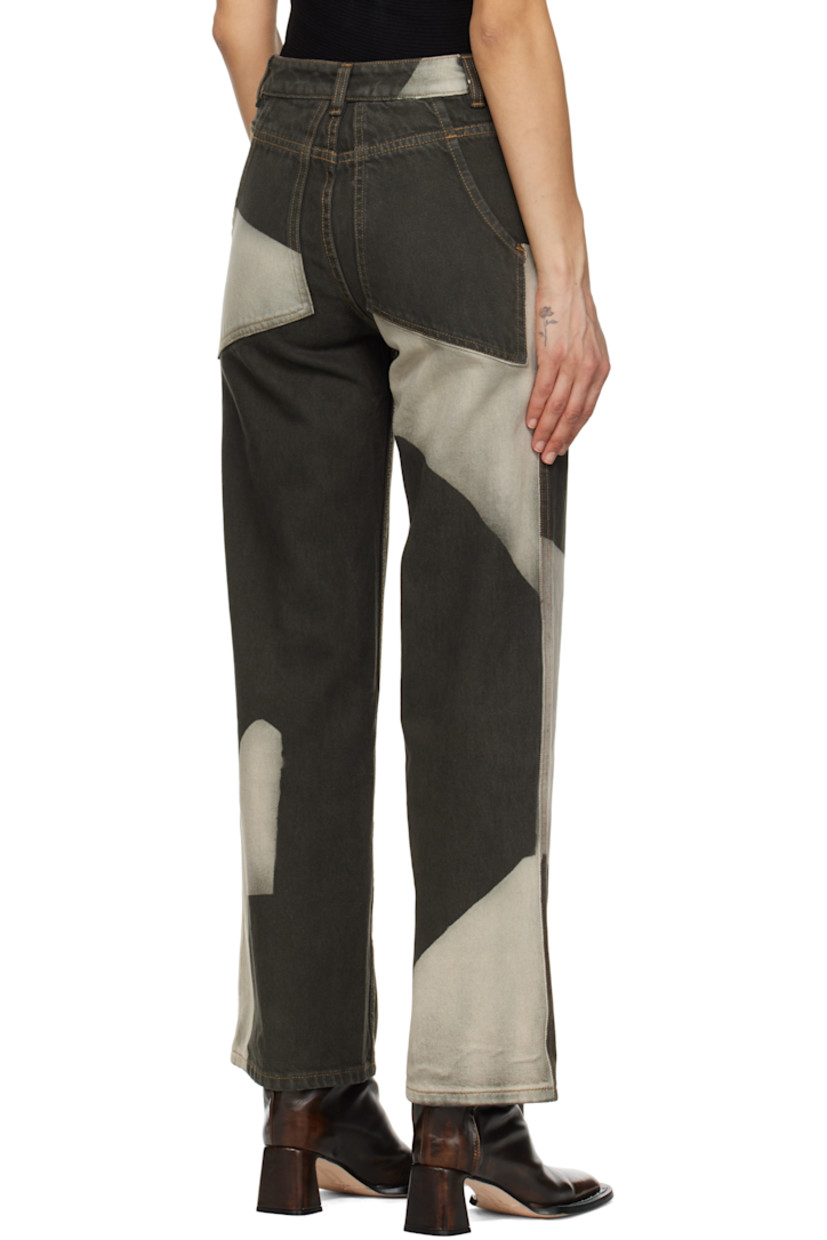 Non-stretch denim jeans. Whiskering and subtle distressing throughout. 

· Colorblocked fading printed throughout
· Belt loops
· Four-pocket styling
· Zip-fly
· Logo-engraved silver-tone hardware
· Contrast stitching in tan

Supplier color: Tile