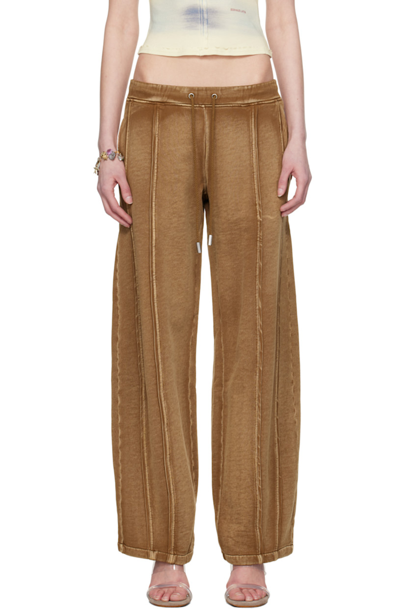 Wide-leg garment-washed brushed French terry lounge pants. Fading throughout.

· Mid-rise
· Drawstring at elasticized waistband
· Two-pocket styling
· Pinched seams at front and back
· Logo printed at back waistband

Supplier color: Bison