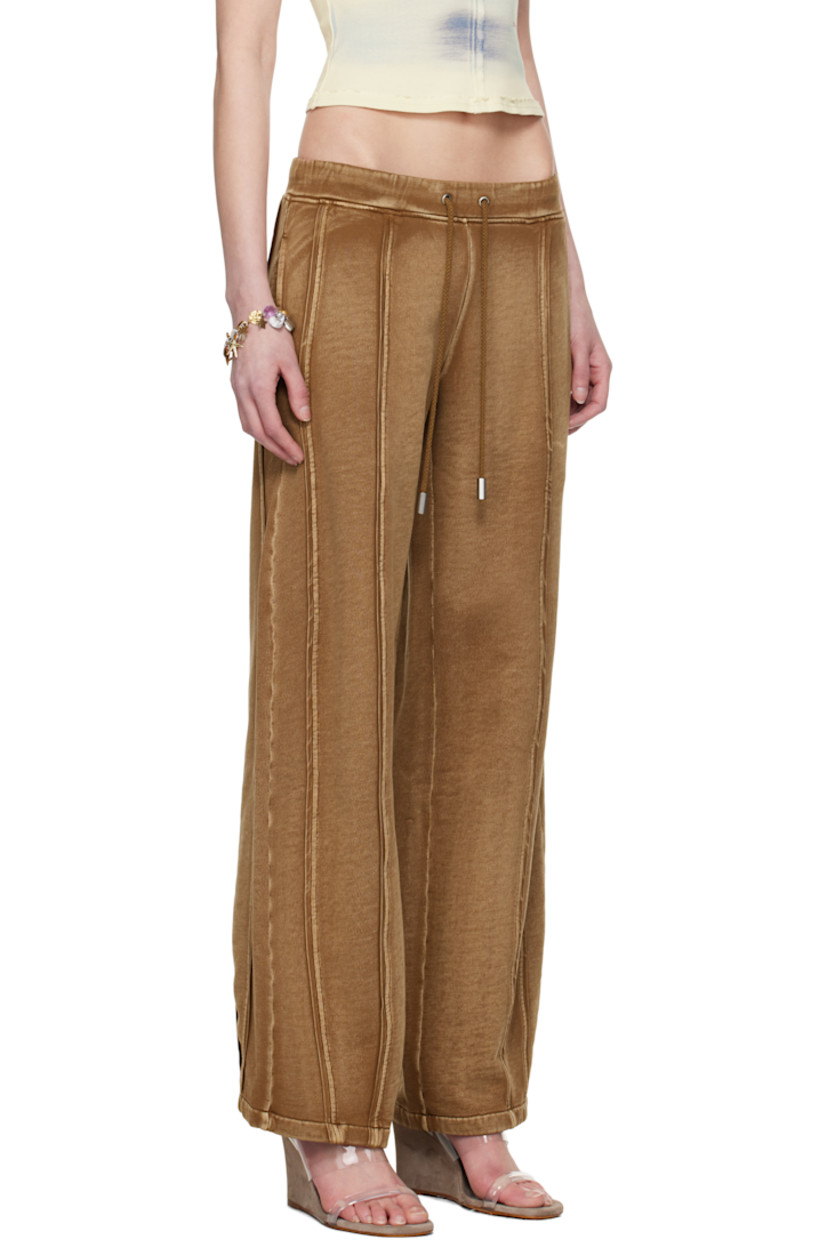 Wide-leg garment-washed brushed French terry lounge pants. Fading throughout.

· Mid-rise
· Drawstring at elasticized waistband
· Two-pocket styling
· Pinched seams at front and back
· Logo printed at back waistband

Supplier color: Bison