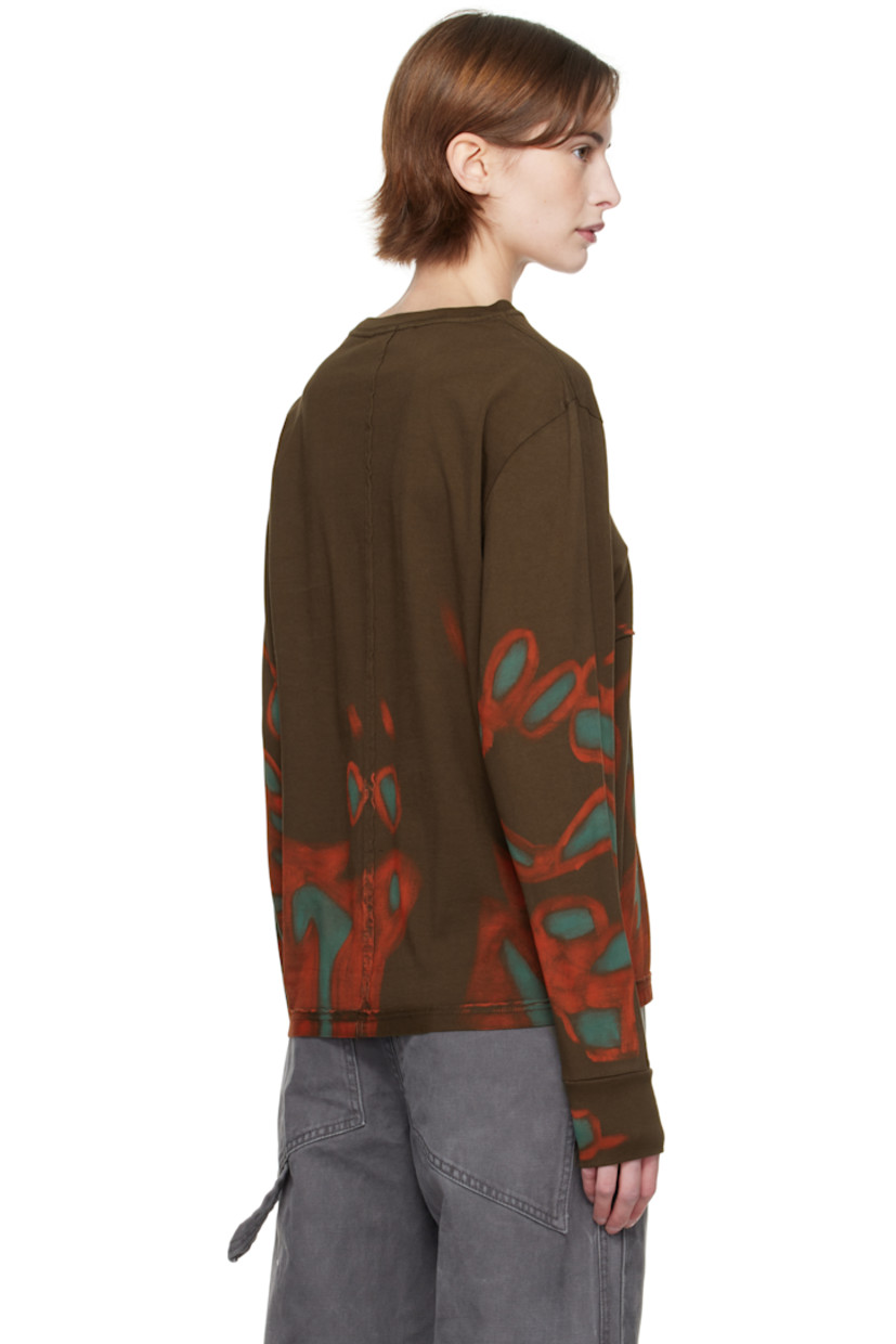 Pima cotton jersey T-shirt. Exposed seams with raw edges and hand-painted graphics throughout.

· Garment-washed
· Rib-knit crewneck
· Logo printed at front

Each item is unique. Please note coloration may vary slightly.

Supplier color: Oil