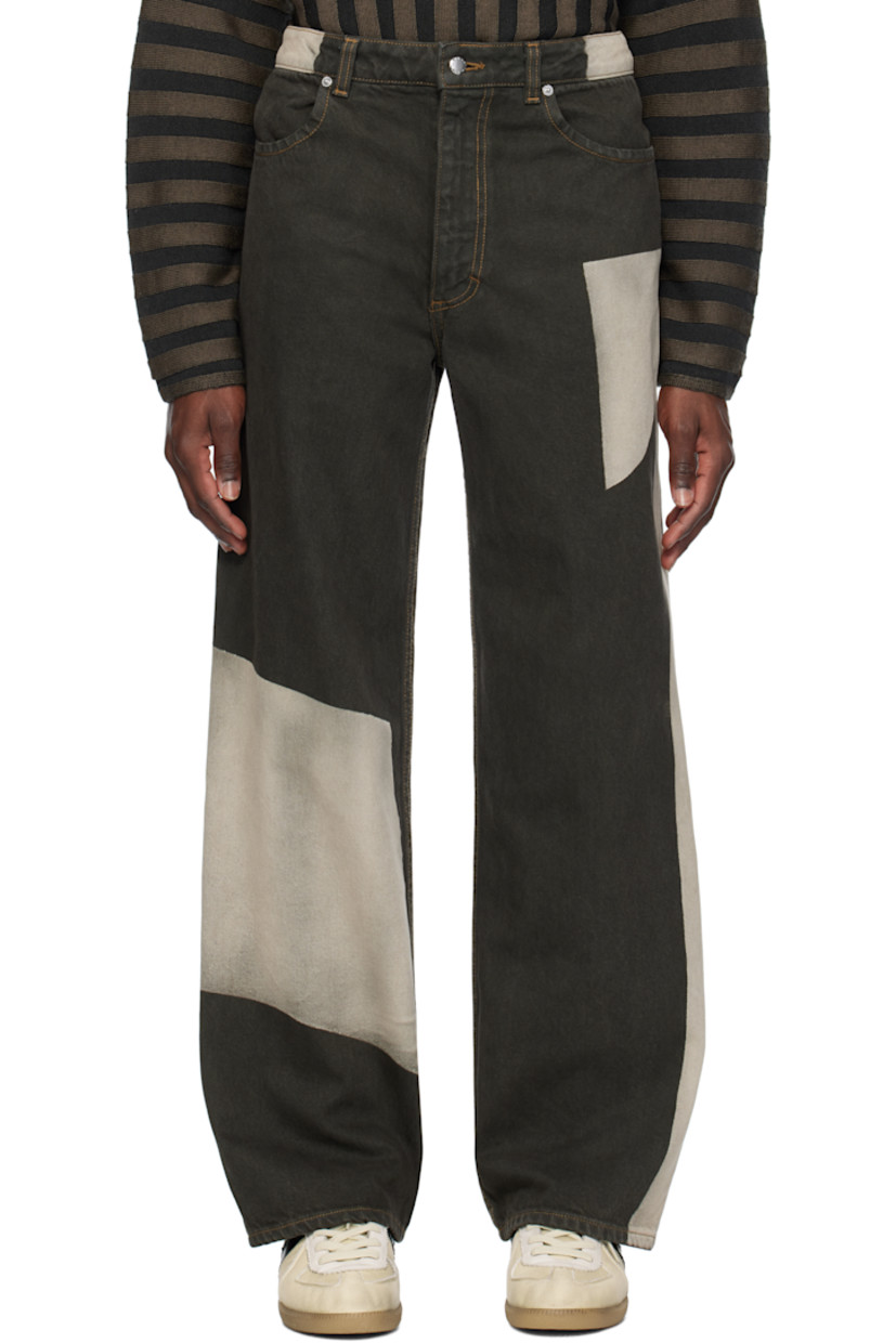 Garment-dyed 13.5 oz non-stretch denim jeans. Colorblocked fading throughout.

· Wide-leg
· Mid-to-high rise
· Belt loops
· Four-pocket styling
· Zip fly
· Logo-engraved silver-tone hardware
· Contrast stitching in tan

Supplier color: Tile