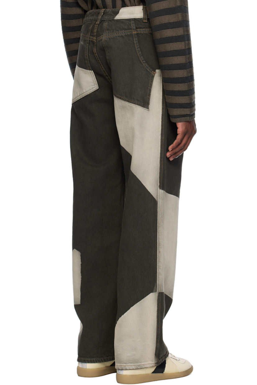 Garment-dyed 13.5 oz non-stretch denim jeans. Colorblocked fading throughout.

· Wide-leg
· Mid-to-high rise
· Belt loops
· Four-pocket styling
· Zip fly
· Logo-engraved silver-tone hardware
· Contrast stitching in tan

Supplier color: Tile
