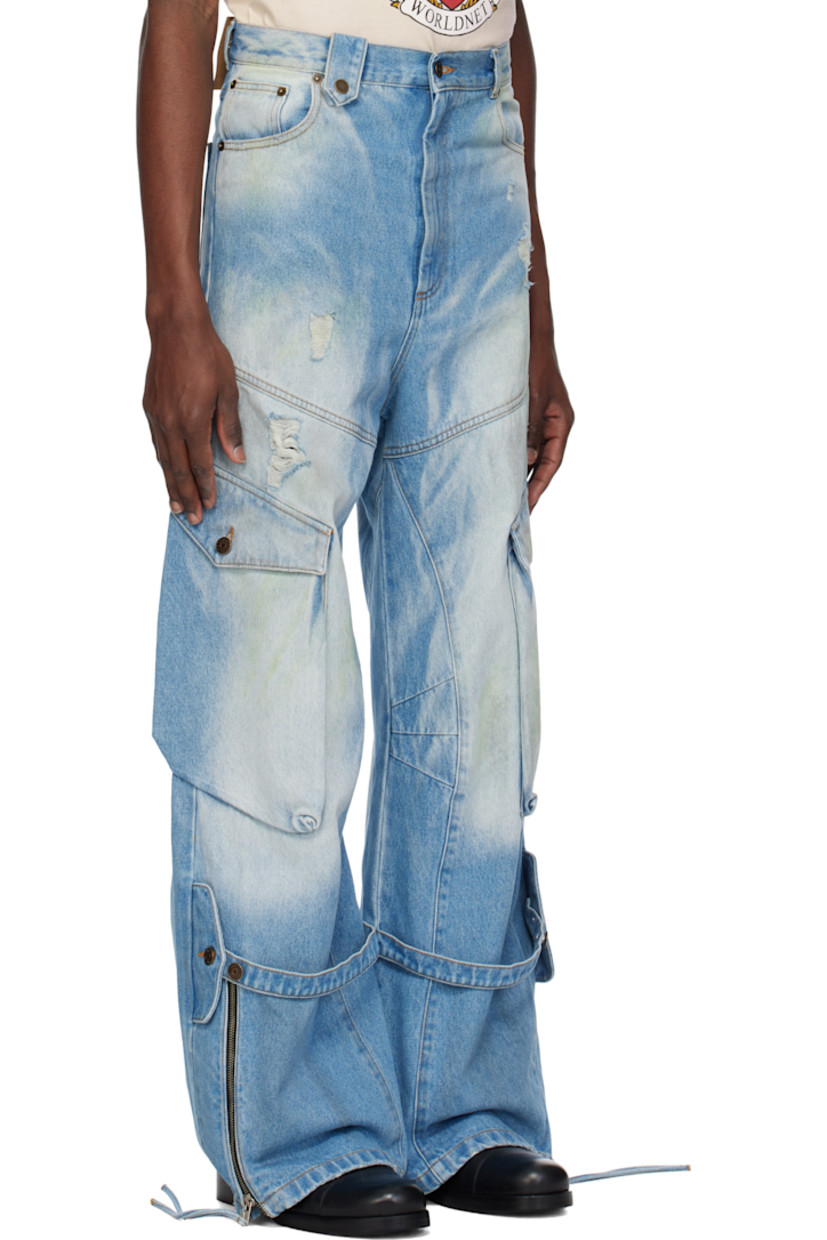Wide-leg non-stretch denim cargo pants. Fading, subtle paint splatter, and smudging throughout.

· Belt loops
· Five-pocket styling
· Zip fly
· Adjustable button strap at legs
· Zip expansion panel at cuffs
· Cargo pocket at outseams
· Logo patch at back waistband
· Contrast stitching in tan

Available exclusively at SSENSE.

Supplier color: Blue dirty