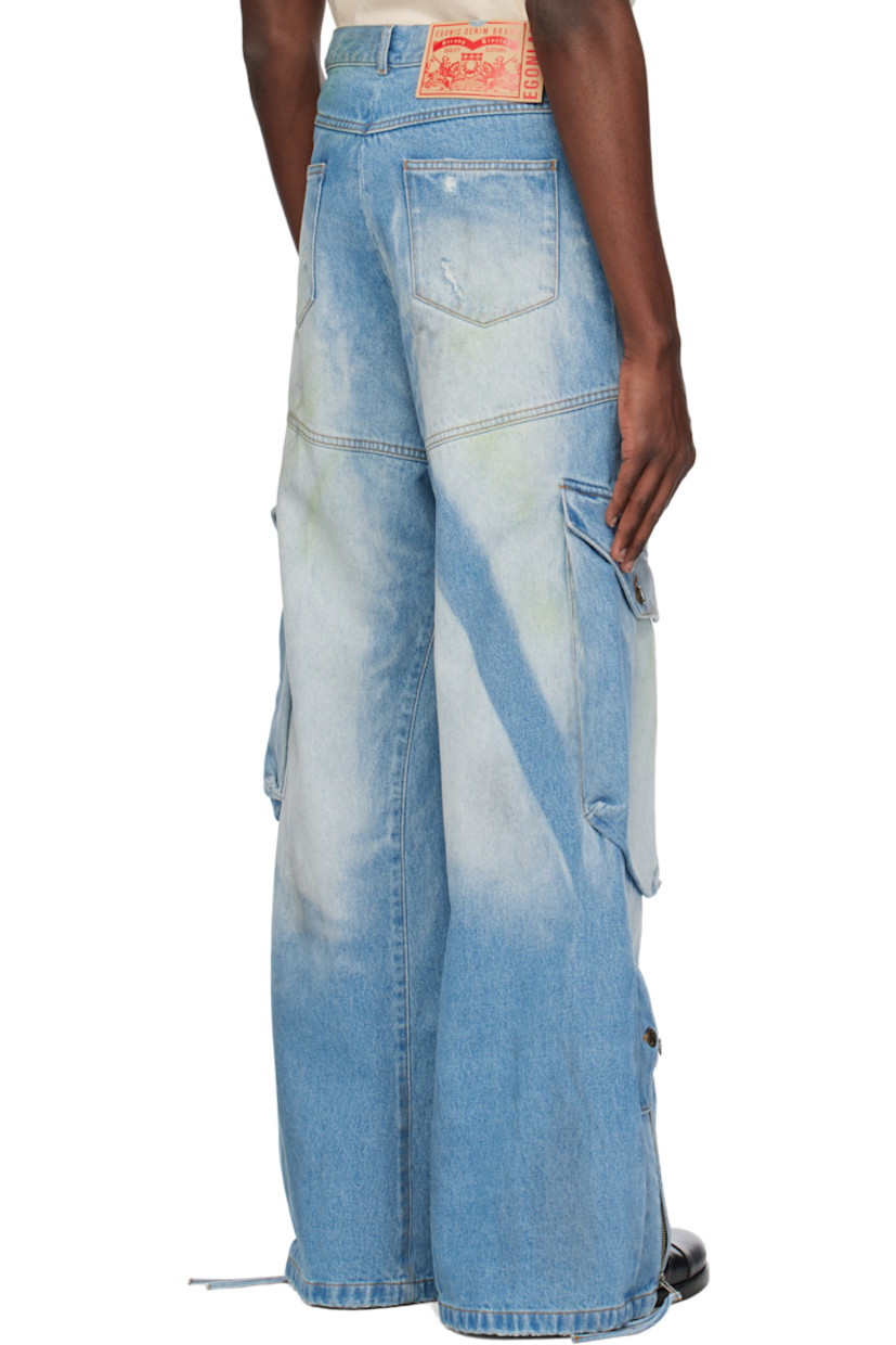 Wide-leg non-stretch denim cargo pants. Fading, subtle paint splatter, and smudging throughout.

· Belt loops
· Five-pocket styling
· Zip fly
· Adjustable button strap at legs
· Zip expansion panel at cuffs
· Cargo pocket at outseams
· Logo patch at back waistband
· Contrast stitching in tan

Available exclusively at SSENSE.

Supplier color: Blue dirty