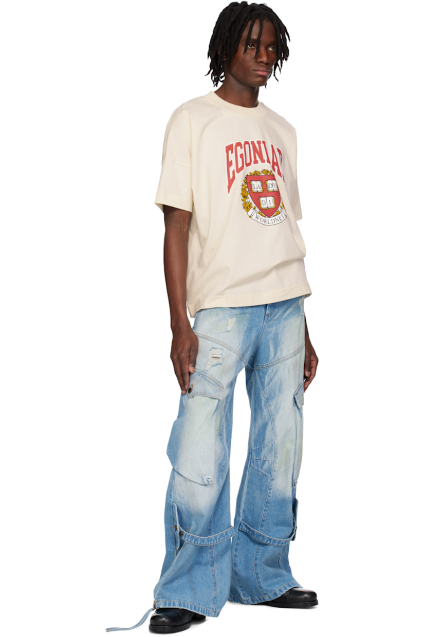 Wide-leg non-stretch denim cargo pants. Fading, subtle paint splatter, and smudging throughout.

· Belt loops
· Five-pocket styling
· Zip fly
· Adjustable button strap at legs
· Zip expansion panel at cuffs
· Cargo pocket at outseams
· Logo patch at back waistband
· Contrast stitching in tan

Available exclusively at SSENSE.

Supplier color: Blue dirty