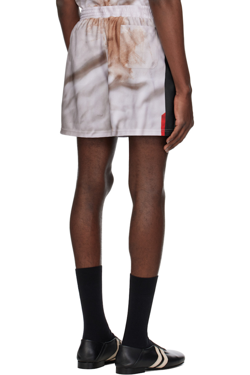 Polyester mesh shorts. Graphic pattern printed throughout.

· Elasticized waistband
· Three-pocket styling
· Logo printed at front
· Vented cuffs

Supplier color: Raintex sublimation