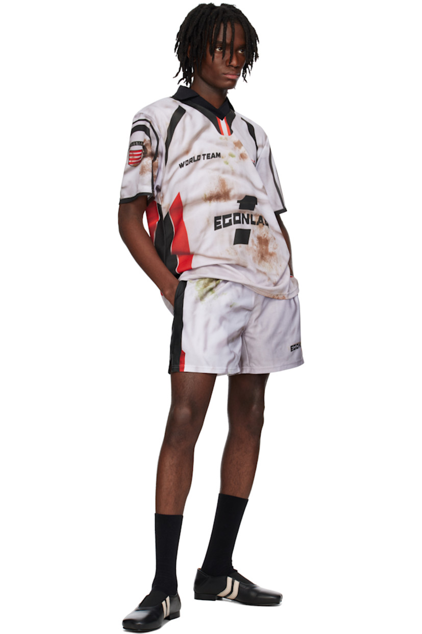 Polyester mesh shorts. Graphic pattern printed throughout.

· Elasticized waistband
· Three-pocket styling
· Logo printed at front
· Vented cuffs

Supplier color: Raintex sublimation