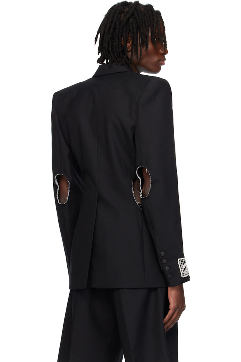 Wool twill blazer.

· Peaked lapel
· Double-breasted button closure
· Welt pockets at chest
· Darts at front
· Cutouts with raw edges at waist and elbows
· Padded shoulders
· Surgeon's cuffs
· Embroidered logo patch at cuff
· Central vent at back hem
· Full logo-woven satin lining

Supplier color: Tailoring black wool
