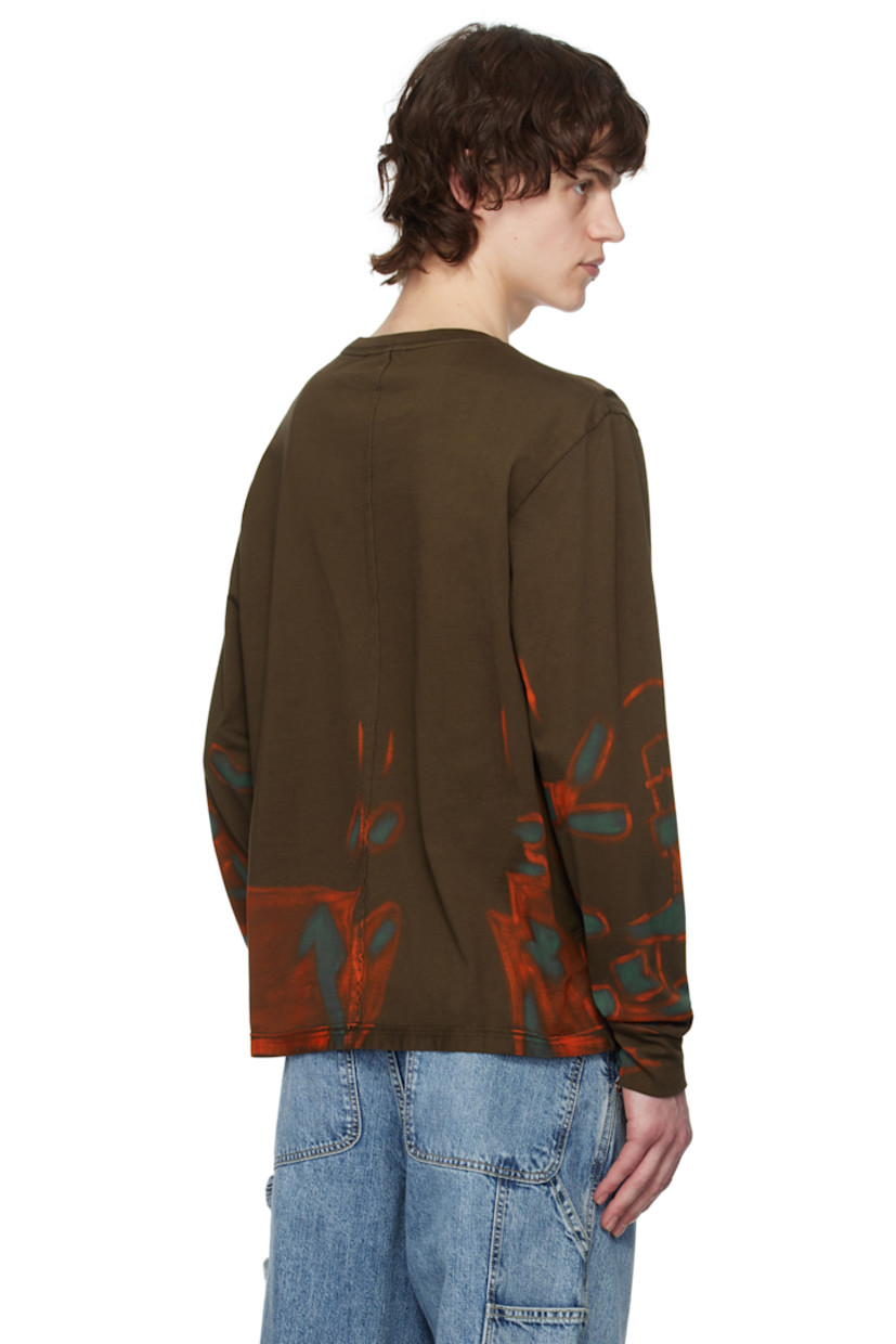 Cotton jersey T-shirt. Exposed seams with raw edges and graphic pattern throughout.

· Paneled construction
· Rib-knit crewneck
· Logo printed at front

Each item is unique. Please note that coloration may vary.

Supplier color: Oil