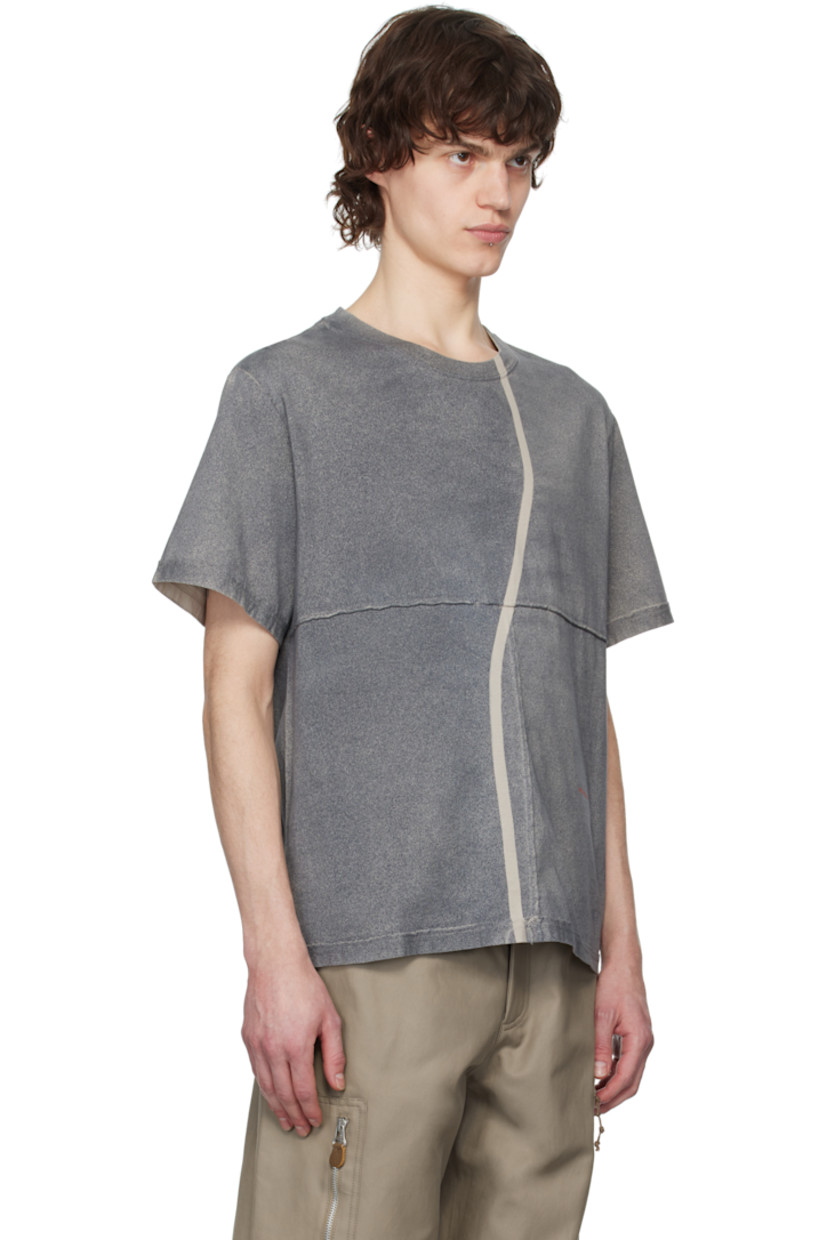 Garment-washed and spray-dyed cotton jersey T-shirt. Exposed seams with raw edges throughout.

· Paneled construction
· Rib-knit crewneck
· Stripe at front and back
· Logo printed at front

Each item is unique. Please note that coloration may vary.

Supplier color: Smog