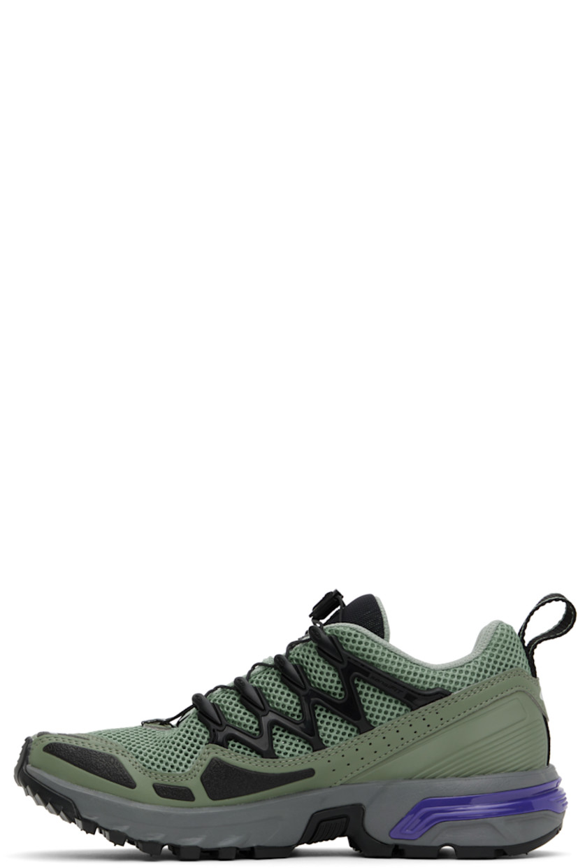 Low-top SensiFit™ mesh and faux-leather sneakers in khaki.

· Rubberized trim and printed logos throughout
· Quicklace™ closure
· Logo patch at padded tongue
· Padded collar
· Pull-loop at heel collar
· Molded breathable OrthoLite® insole
· Mesh lining 
· Agile Chassis™ System rubber midsole
· Treaded Mud Contagrip® rubber outsole

Supplier color: Green milieu/Agave green/Liberty