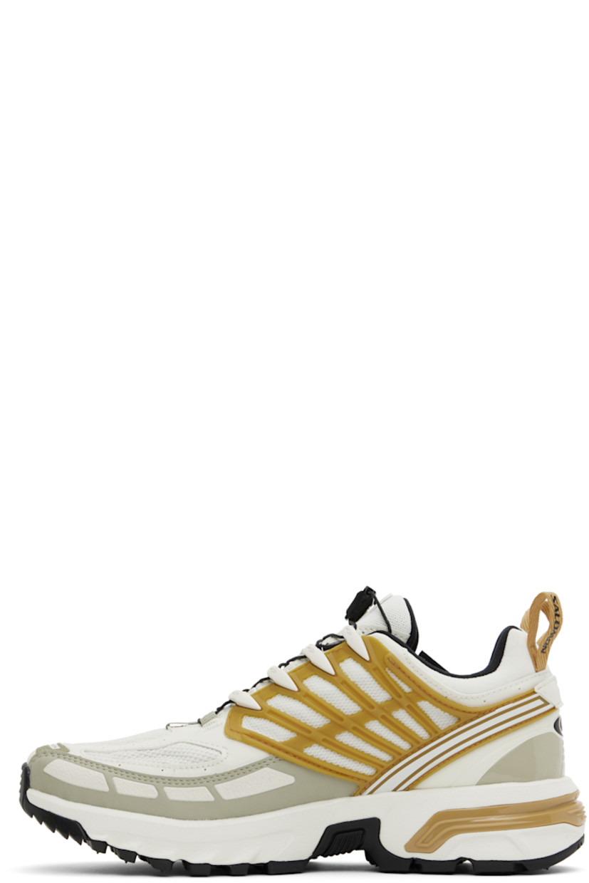 Low-top GORE-TEX™ SensiFit™ Kurim mesh and faux-leather sneakers in off-white.

· Waterproof
· Rubberized trim and printed logos throughout
· Quicklace™ closure
· Logo patch at padded tongue
· Padded collar
· Logo flag at outer side
· Logo-bonded pull-loops at heel tab
· OrthoLite® insole
· Jersey lining
· Agile Chassis™ System at rubber midsole
· Treaded All Terrain Contagrip® rubber sole

Supplier color: Icicle/Antelope/Tea