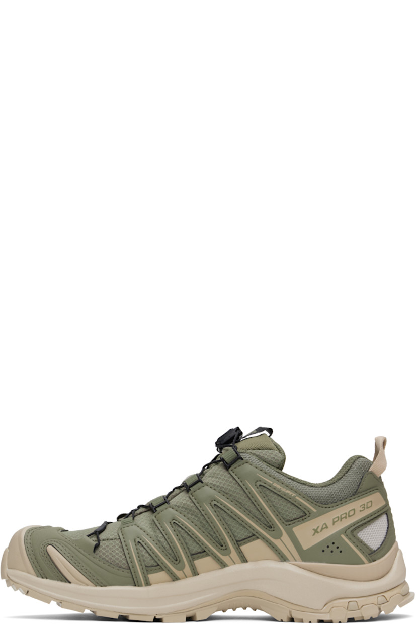 Low-top GORE-TEX® sensiFIT™ mesh and textured faux-leather sneakers in khaki.

· Waterproof
· Quicklace™ closure
· Logo-woven pull-loop at tongue
· Padded tongue and collar
· Reflective trim and logo printed at outer side
· Pull-loop at heel tab
· Logo embossed at heel
· Molded OrthoLite® footbed
· 3D Advanced Chassis™ foam rubber midsole
�· Treaded All Terrain Contagrip® rubber outsole

Supplier color: Deep lichen green/White pepper/Silver Cloud