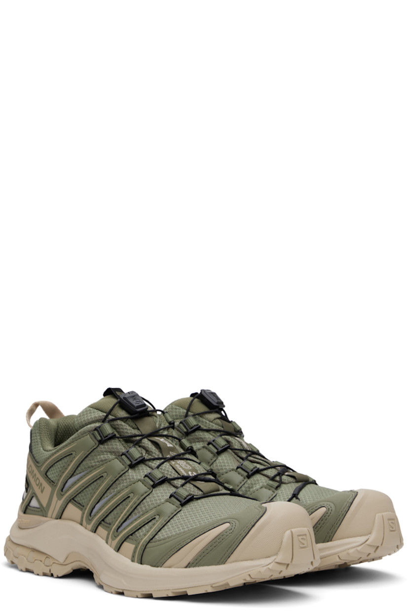 Low-top GORE-TEX® sensiFIT™ mesh and textured faux-leather sneakers in khaki.

· Waterproof
· Quicklace™ closure
· Logo-woven pull-loop at tongue
· Padded tongue and collar
· Reflective trim and logo printed at outer side
· Pull-loop at heel tab
· Logo embossed at heel
· Molded OrthoLite® footbed
· 3D Advanced Chassis™ foam rubber midsole
· Treaded All Terrain Contagrip® rubber outsole

Supplier color: Deep lichen green/White pepper/Silver Cloud