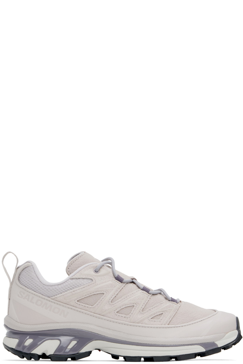 Low-top suede, grained leather, and mesh sneakers in taupe.

· Piping throughout
· Cap toe
· Lace-up closure
· Logo printed at tongue and outer side
· Padded tongue and collar
· SensiFit™ panel at sides
· Pull-loop with reflective trim at heel tab
· Molded OrthoLite® footbed
· Jersey lining
· Foam rubber EnergyCell midsole 
· Agile Chassis™ System at midsole
· Treaded Mud Contagrip® rubber sole

Supplier color: Ashes of roses/Ashes of roses/Excalibur