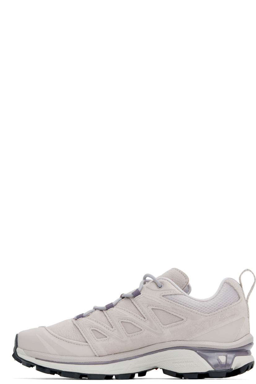 Low-top suede, grained leather, and mesh sneakers in taupe.

· Piping throughout
· Cap toe
· Lace-up closure
· Logo printed at tongue and outer side
· Padded tongue and collar
· SensiFit™ panel at sides
· Pull-loop with reflective trim at heel tab
· Molded OrthoLite® footbed
· Jersey lining
· Foam rubber EnergyCell midsole 
· Agile Chassis™ System at midsole
· Treaded Mud Contagrip® rubber sole

Supplier color: Ashes of roses/Ashes of roses/Excalibur